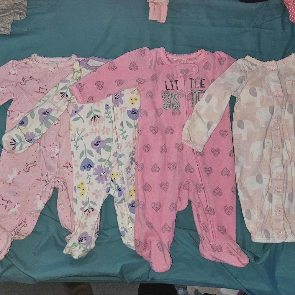 Newborn size pajamas. 3 footies and 1 night gown